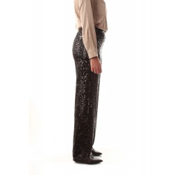 Pantaloni flare con paillettes nero vista laterale indossato