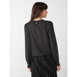 Blusa in crepe nero fantasia pois vista posteriore indossata